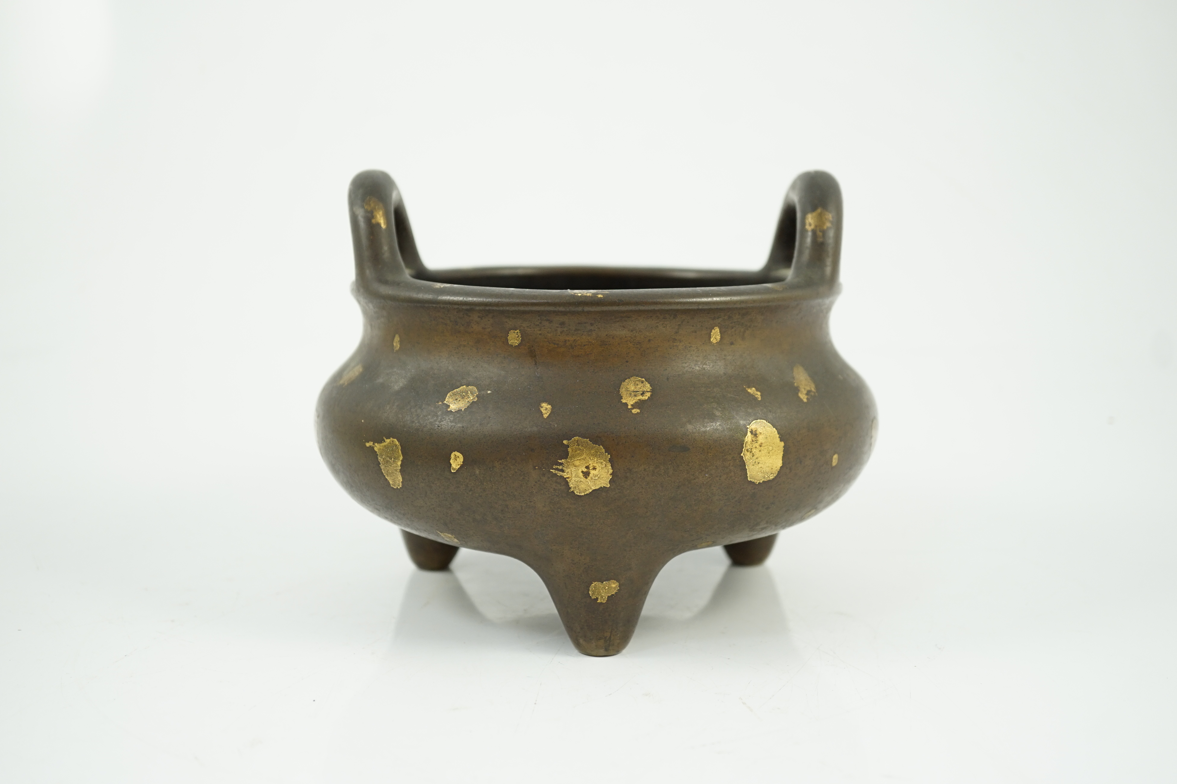 A large Chinese gold-splashed bronze tripod censer, ding, Kangxi period